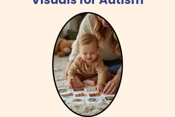 Young child exploring picture cards on the floor with a parent